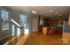 Kitchen breakfast area with hardwood floors and bay window at 2306 Cota Ct, Charlotte, NC 28262