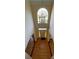 Two-story foyer with hardwood floors and chandelier at 2306 Cota Ct, Charlotte, NC 28262