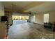 Two-car garage with shelving and storage at 2306 Cota Ct, Charlotte, NC 28262