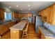 Large kitchen with island, granite countertops, and stainless steel appliances at 2306 Cota Ct, Charlotte, NC 28262