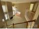 Open living room with high ceilings and a fireplace at 2306 Cota Ct, Charlotte, NC 28262