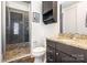 Bathroom with walk-in shower and granite vanity at 2338 Yadkin Ave # 505, Charlotte, NC 28205