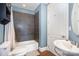 Clean bathroom with a shower/tub combo and pedestal sink at 2338 Yadkin Ave # 505, Charlotte, NC 28205