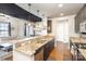 Modern kitchen with granite countertops and dark cabinets at 2338 Yadkin Ave # 505, Charlotte, NC 28205