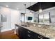 Modern kitchen featuring stainless steel appliances, granite countertops, and dark wood cabinetry at 2338 Yadkin Ave # 505, Charlotte, NC 28205