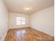 Bright bedroom with hardwood floors and large windows at 2433 1St Nw St # 23, Hickory, NC 28601