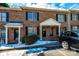 Brick building exterior with multiple units and snow-covered ground at 2433 1St Nw St # 23, Hickory, NC 28601