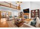 Bright living room featuring a fireplace, hardwood floors, and open floor plan at 2510 Burton Estates Ln, Lincolnton, NC 28092