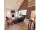Inviting living room featuring a fireplace and open layout to the dining area, perfect for entertaining guests at 3613 Savannah Way, Monroe, NC 28110