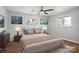 Serene bedroom with neutral tones, hardwood floors, and ample natural light, creating a tranquil retreat at 4331 Sulphur Springs Ne Rd, Hickory, NC 28601