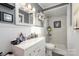 Clean bathroom featuring a shower/tub combo and white vanity at 605 Impala Dr, Albemarle, NC 28001