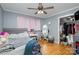 Bedroom with hardwood floors, ceiling fan and walk-in closet at 605 Impala Dr, Albemarle, NC 28001