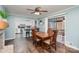 Bright dining room with view into kitchen and access to back patio at 605 Impala Dr, Albemarle, NC 28001