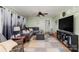 Spacious living room with sectional sofa and large TV at 605 Impala Dr, Albemarle, NC 28001