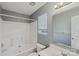 Clean bathroom, bathtub, and vanity at 6345 Cora St, Charlotte, NC 28216