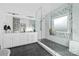 Elegant bathroom with a large walk-in shower, double vanity, and soaking tub at 1009 Murandy Ln, Matthews, NC 28104