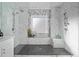 Large bathroom with double shower heads and a built-in marble bench seat at 1009 Murandy Ln, Matthews, NC 28104