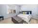 Comfortable bedroom with a plush bed and plenty of natural light at 1009 Murandy Ln, Matthews, NC 28104