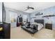 Spacious bedroom with a black leather bed and a built-in media center at 1009 Murandy Ln, Matthews, NC 28104