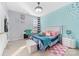 Charming bedroom with a unique teal accent wall at 1009 Murandy Ln, Matthews, NC 28104