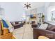 Spacious living room with a cozy fireplace and ample seating at 1009 Murandy Ln, Matthews, NC 28104