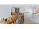 Spacious upper hallway with wood flooring and iron railings at 1009 Murandy Ln, Matthews, NC 28104