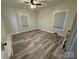 Well-lit bedroom featuring new wood-look flooring and ceiling fan at 110 Courtland St, Chester, SC 29706