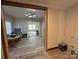 Open concept dining area, new flooring, view into living room at 110 Courtland St, Chester, SC 29706