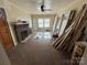 Living room with hardwood floors and brick fireplace at 110 Courtland St, Chester, SC 29706