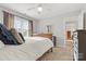 Spacious bedroom with double bed and access to a shared bath at 1138 Millwright Ln, Matthews, NC 28104