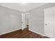 Spacious bedroom with hardwood floors and access to another room at 138 Pinckney St, Chester, SC 29706