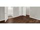 Bedroom with hardwood floors and access to a bathroom at 138 Pinckney St, Chester, SC 29706