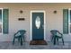 Inviting front door with sidelights and green chairs at 138 Pinckney St, Chester, SC 29706
