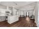Modern kitchen with white cabinets and a large island at 138 Pinckney St, Chester, SC 29706