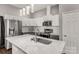 Modern kitchen with stainless steel appliances and island at 138 Pinckney St, Chester, SC 29706
