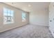 Bedroom with gray carpet and two windows at 1423 Pine Heart Dr, Edgemoor, SC 29712