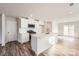 Modern kitchen with white cabinets, quartz countertops, and an island at 1423 Pine Heart Dr, Edgemoor, SC 29712