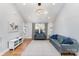 Bright living room with hardwood floors and comfy couches at 1512 Herrin Ave, Charlotte, NC 28205