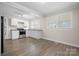 Renovated kitchen with white cabinets and stainless steel appliances at 1529 4Th Ne St, Hickory, NC 28601