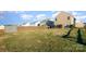 Spacious backyard with privacy fence and grassy area at 195 Hidden Lakes Rd, Statesville, NC 28677
