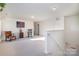 Spacious loft area with an American flag and comfortable seating at 195 Hidden Lakes Rd, Statesville, NC 28677