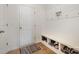 Bright mudroom with built-in bench, cubbies, and coat hooks at 195 Hidden Lakes Rd, Statesville, NC 28677