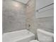 Bathroom with a shower/tub combo and wood-look tile at 206 Hunter St, York, SC 29745