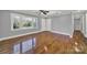 Bright living room with hardwood floors and a view into the kitchen at 206 Hunter St, York, SC 29745
