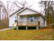 Cute bungalow with front porch and mature trees at 241 Henning Dr, Albemarle, NC 28001