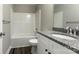 Clean bathroom with granite countertop, tub, and toilet at 277 Stewart Nw St, Concord, NC 28027