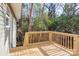 Wooden deck overlooking a wooded area at 277 Stewart Nw St, Concord, NC 28027