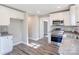 Open concept kitchen with white cabinets and granite countertops at 277 Stewart Nw St, Concord, NC 28027