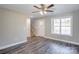 Bright living area with hardwood floors and a view of the staircase at 277 Stewart Nw St, Concord, NC 28027