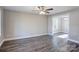 Spacious living room with hardwood floors and neutral-colored walls at 277 Stewart Nw St, Concord, NC 28027